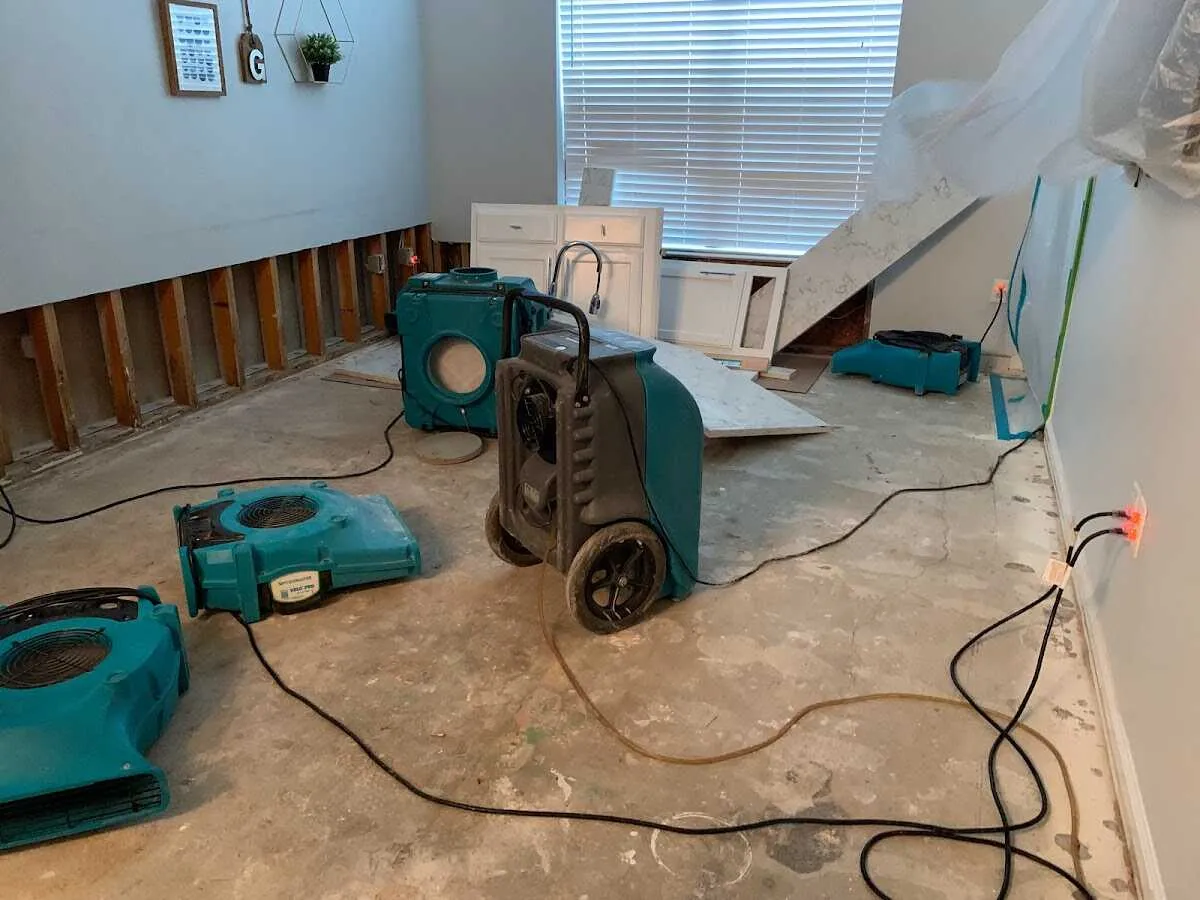 Dehumidifier in flood-cut room for Water Damage Restoration in Corbin